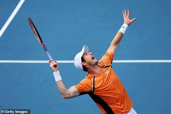 MIAMI GARDENS, FLORIDA - MARCH 21: Andy Murray of Great Britain serves with Sebastian Korda against Julian Cash of Great Britain and Tallon Greekpoor of the Netherlands during their match on Day 6 of the Miami Open at Hard Rock Stadium on March 21, 2024 in Miami Gardens, Florida.  (Photo by Al Bello/Getty Images)