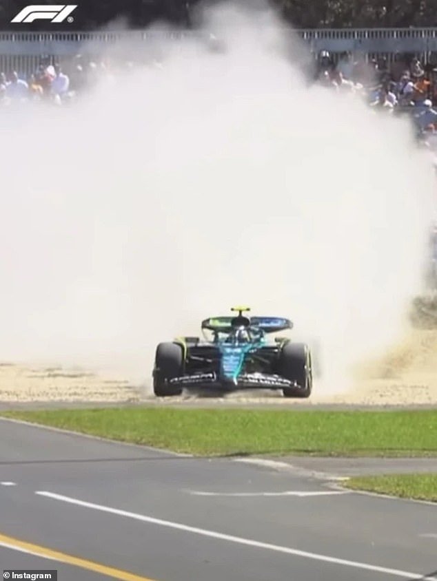 Fernando Alonso made a wide turn, kicking up gravel and debris as he went off track