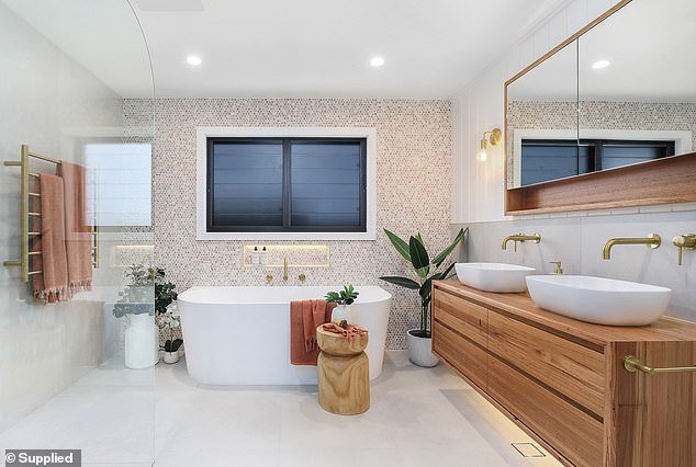 Now there is a freestanding bath, a lush shower and double sinks