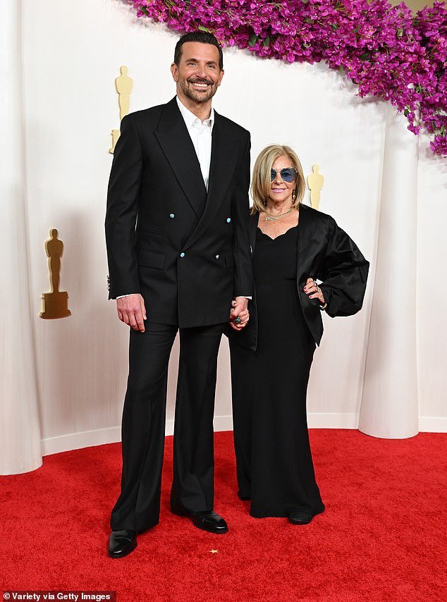 Gigi wasn't by Bradley's side at the Oscars, as the Maestro director-writer-star brought his mother Gloria Campano to the ceremony at the Dolby Theater;  pictured at the Oscars