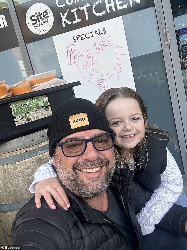The father of three said he does everything he can to help those in need, claiming that 'there is more to life than having money in my pockets' (pictured, Mr Mezei with his youngest daughter Amie)