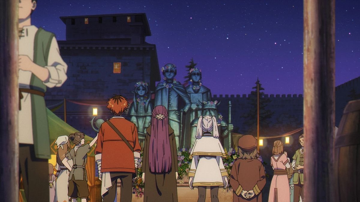 A red-haired young man in a red coat, a purple-haired girl and a small elf woman with white hair stare at a group of statues in the middle of a city square