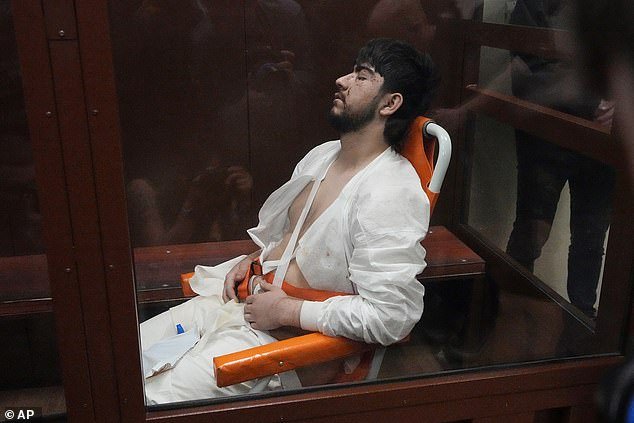 Muhammadsobir Fayzov (pictured) was unconscious when he was taken to court