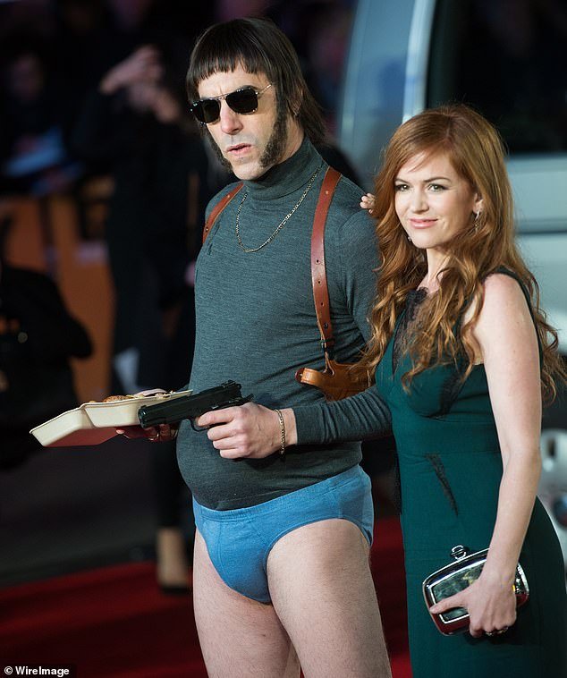 Cohen, dressed in character, and wife Fisher attend the 2016 world premiere of Grimsby