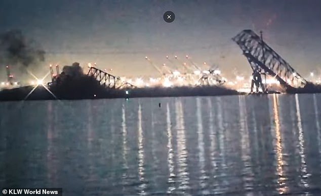 A livestream showed the disaster unfolding, with the ship plowing into a pile supporting the central part of the bridge.  The road and steel arches immediately fall into the water