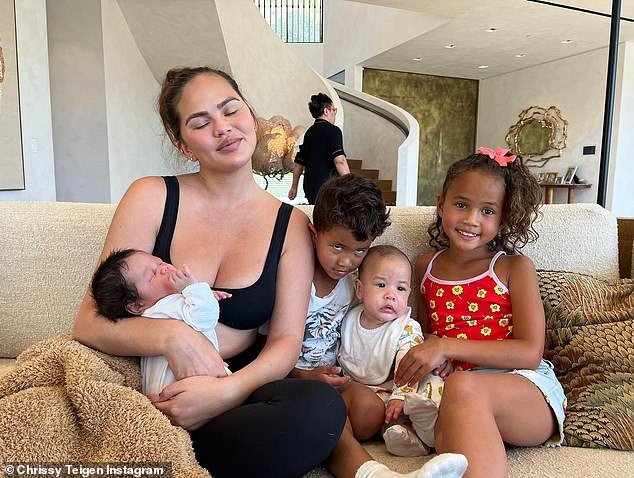 Teigen and Legend left their adorable brood - including Luna, seven, Miles, five, 13-month-old Esti and nine-month-old Wren - home for a night out to celebrate the grand opening of Donatella Versace and the Grand Lisboa Palace Resort.  second Palazzo Versace hotel in Macau, often referred to as the 'Las Vegas of Asia'