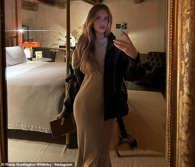 Mother-of-two Rosie took a selfie in her bedroom's huge gold-framed mirror, wearing a black jacket slung over her shoulder