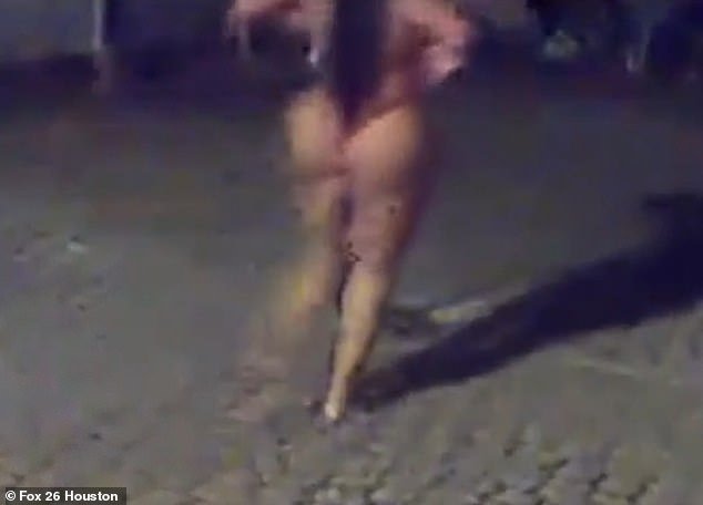 A scantily clad woman was also filmed walking around the neighborhood in a thong.  It is unclear whether she was one of the two people caught having sex on the balcony