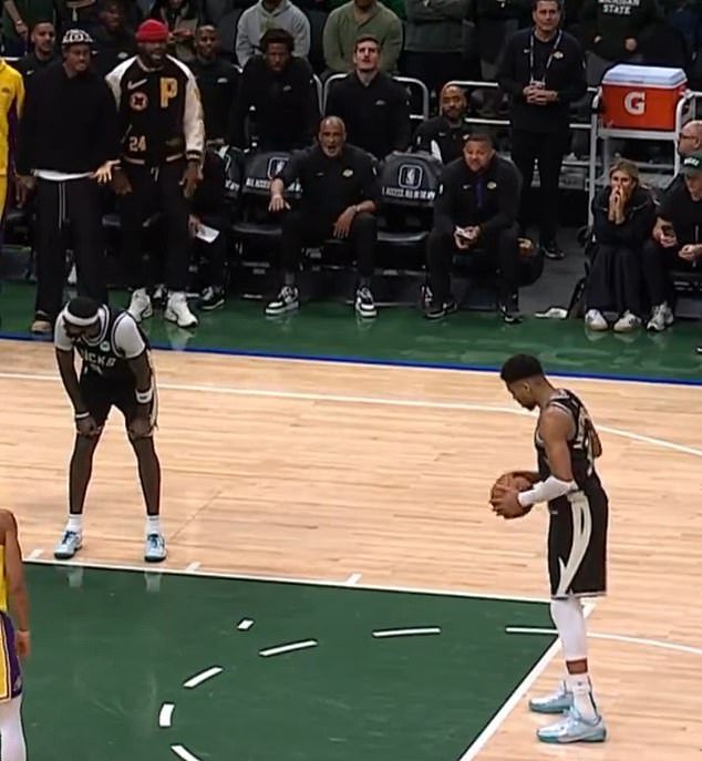 James (above left) was seen counting out loud as Giannis Antetokounmpo took a free throw