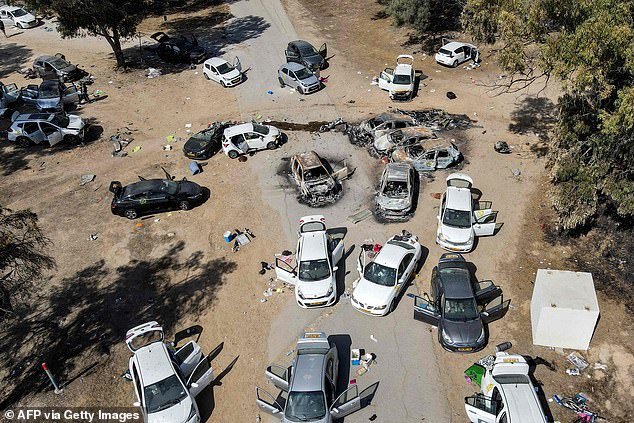 Aerial photo shows abandoned and torched vehicles at the scene of the October 7 attack on the Supernova desert music festival