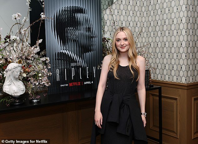1711524143 906 Dakota Fanning rocks chic LBD as shes supported by little