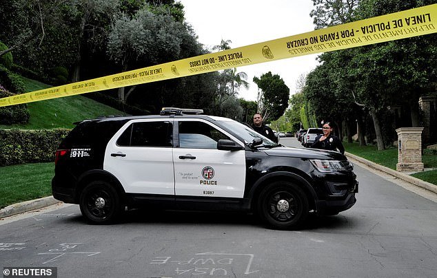 During the raids, two of his sons were held at the scene of the home in Holmby Hills, California, while the warrant was executed, but released without charge.