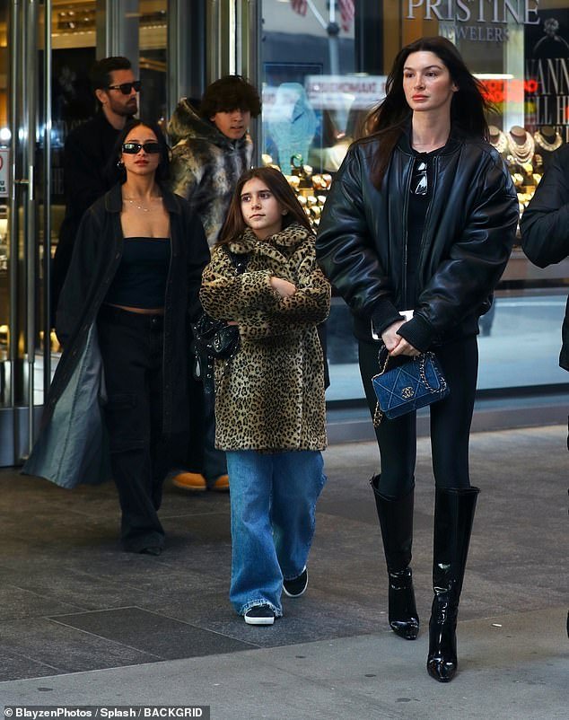 Bella stepped out with Scott and his children Mason, Penelope and Reign as they visited a jewelry store