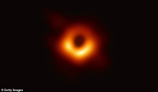 The twisting structure of Sgr A* is similar to that of the first and only other black hole photographed, Messier 87 (pictured), suggesting that all black holes possess strong magnetic fields - a concept that challenges previous studies