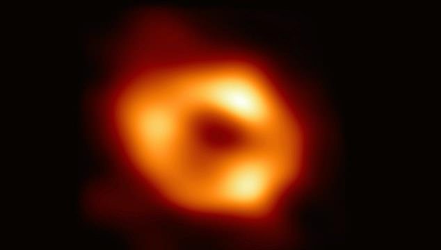 The first image of Sgr A* showed him as a glowing red-orange colored donut hanging in the darkness of space - but the structure was also too blurry to make out details