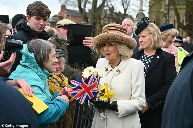 Queen Camilla comes out to meet well-wishers in Worcester today after attending the service