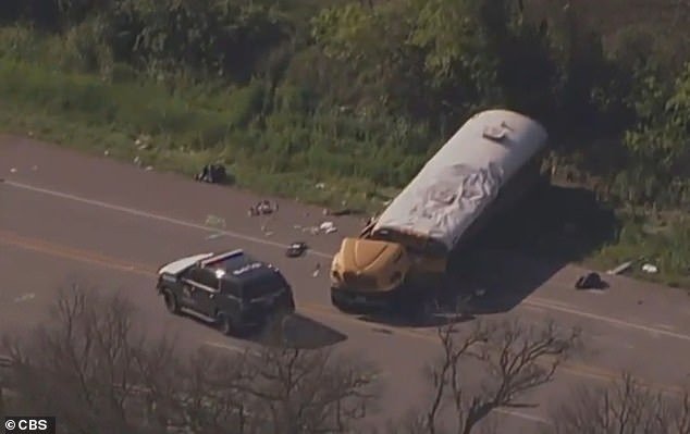 Aerial photographs taken after the collision show debris scattered across the highway, as the mangled bus sits stationary and police stand around it