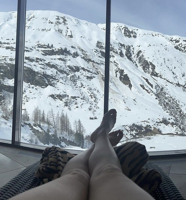 Martel posted a photo of the couple enjoying a refreshing pint while in another photo she showed off her legs in front of the breathtaking Alps