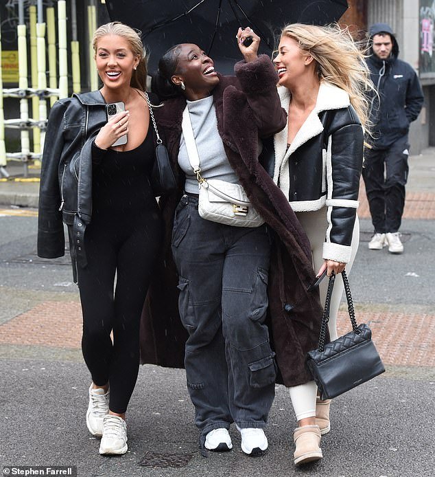 Hours after the reports surfaced, Jess put on a defiant display as she braved the rain during an outing with her boyfriend Kaz Kamwi and her sister Eve
