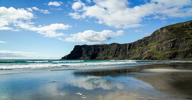The tranquil Talisker Bay on the Isle of Skye fascinates with its black volcanic sand.  OS raster reference: NG 30755 30447