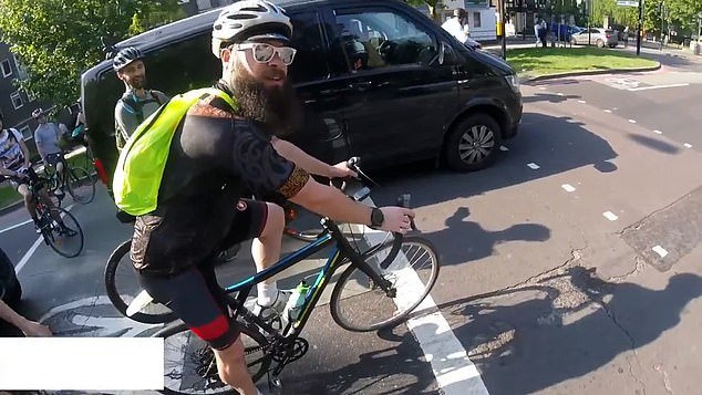 At the next step at the traffic light the cyclist with camera says: 'It's okay if you want to do it, but if I don't shut your damn mouth'