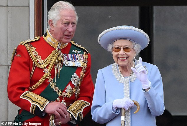 Pictured: Elizabeth and her son Charles on the balcony of Buckingham Palace after the Queen's Birthday Parade, the Trooping the Colour, in June 2022