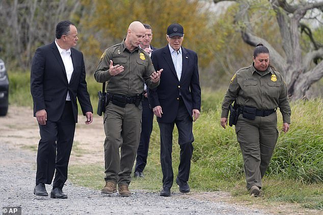 President Joe Biden, center, surveys the southern border.  He is accompanied here by USBP chief Jason Owens (center left) on February 29, 2024.