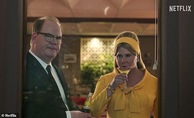On the far left is Jim Gaffigan with Amy in yellow sipping a martini