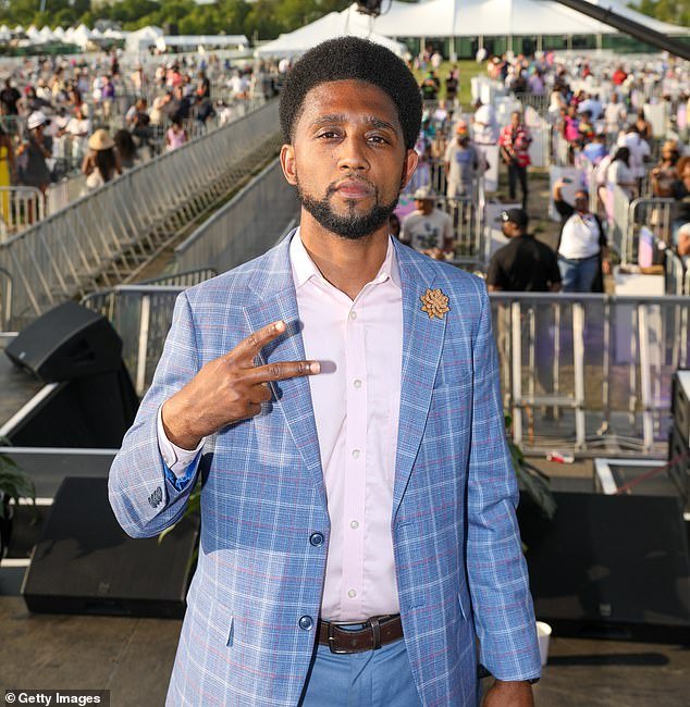 Scott poses for a photo at the 2021 Preakness horse racing festival