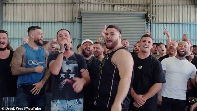 Tuivasa (centre), nicknamed 'Bam Bam' for his all-or-nothing fighting style, owns a brewery in western Sydney with superstar Nathan Cleary (front, second from right) - with the pair working alongside music star Shannon Noll (in hand microphone) to advertise their beer