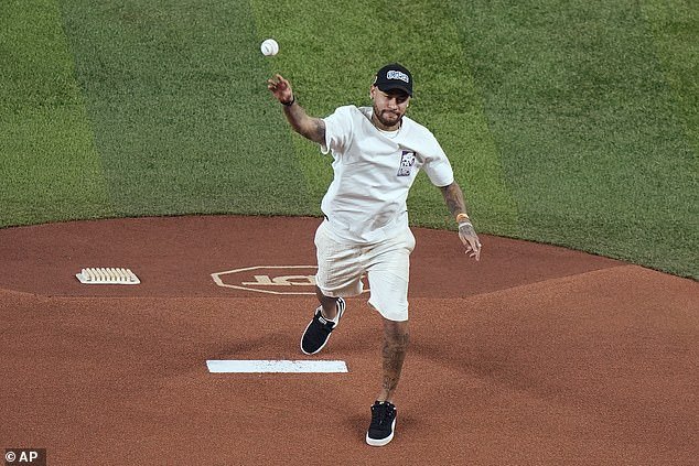 On Thursday, Neymar threw the ceremonial first pitch at the game against the Miami Marlins