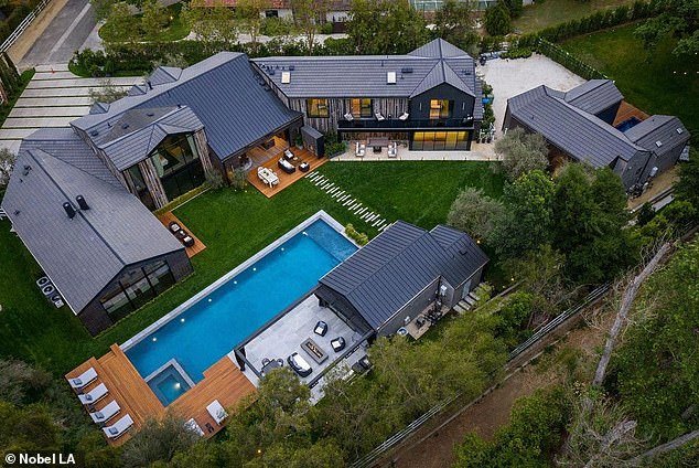 With double vaulted ceilings and spacious open space, the Melbourne-born NBA star is a glorious trophy home.