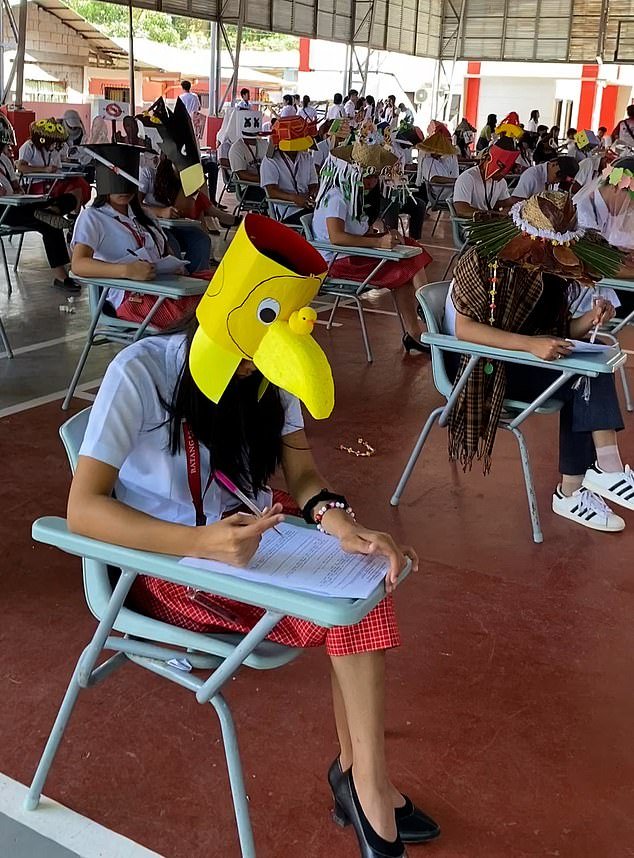 A series of huge 'anti-cheating hats' were worn by the students in the Philippines