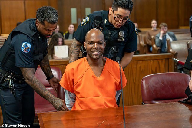 During a hearing for the charges Thursday in New York State Supreme Court, Martin flashed a smile while wearing a bright orange jumpsuit