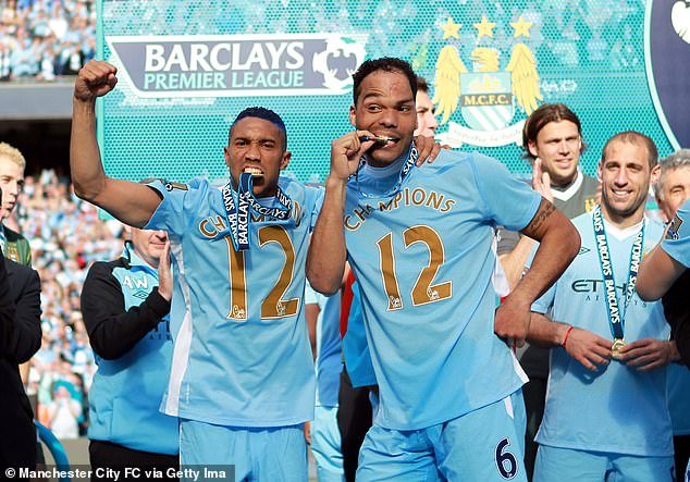Clichy, pictured here with Joleon Lescott, won the Premier League title twice with Man City