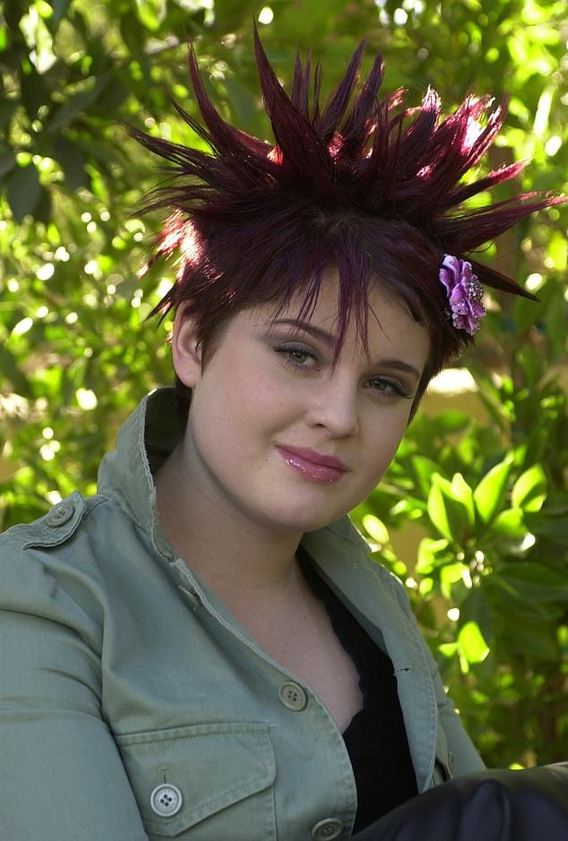 Kelly was also a fan of the spiky hair look, pictured here on family show The Osbournes wearing purple