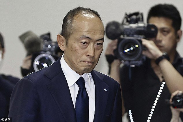 The health giant admitted it was aware of problems with the products, which are not sold in Britain, as early as January.  Yet the first public announcement did not come until March 22.  Pictured, Akihiro Kobayashi, president of Kobayashi Pharmaceutical, arrives at a press conference in Osaka today
