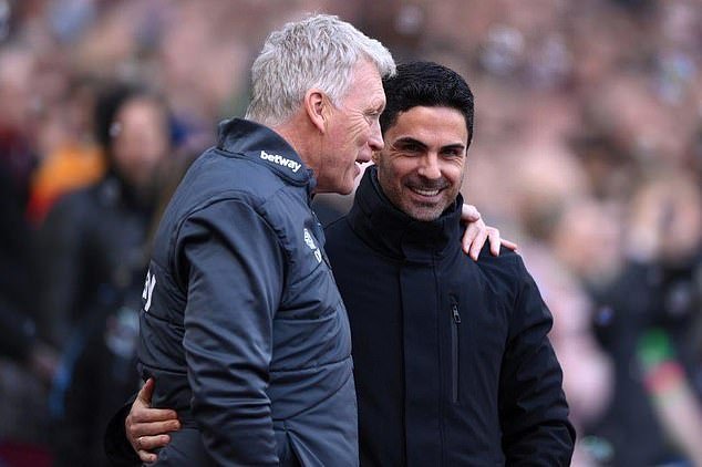 Arteta, who is now in charge in north London, greets his former Everton manager David Moyes