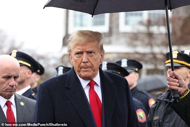 Former US President Donald Trump speaks to the media after attending the aftermath of slain NYPD officer Jonathan Diller at the Massapequa Funeral Home on March 28, 2024 in Massapequa, New York