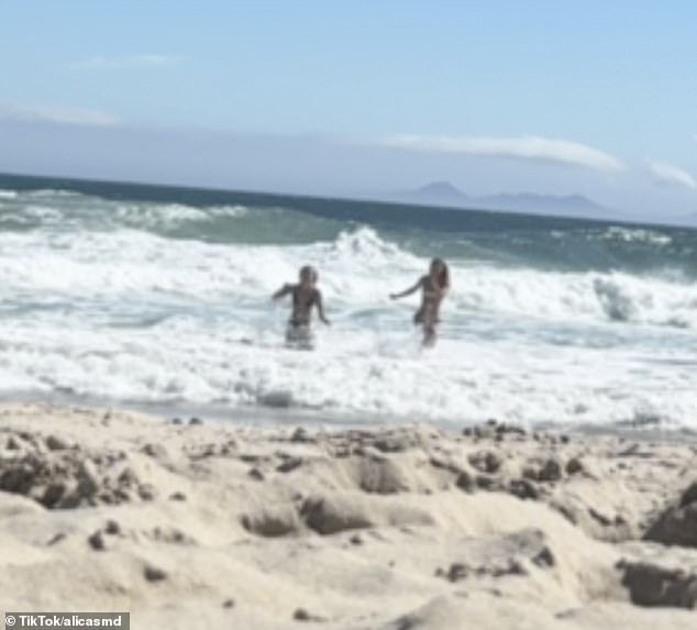 They soon noticed something suspicious about the camera they had set up and came running back from the sea