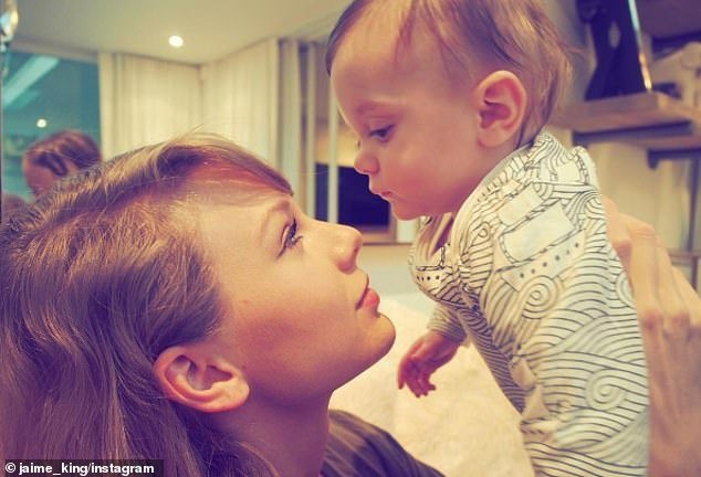 Swift is godmother to actress Jaime King's child and they have taken adorable photos together