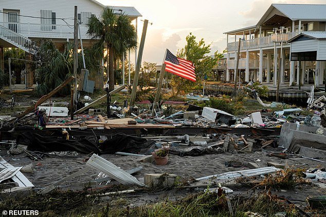The numbers are in stark contrast to the historical average, which typically sees fourteen named storms, seven hurricanes, three major hurricanes, and four direct impacts to the US.  Pictured: The wreckage of Darlene Powell's home following the arrival of Hurricane Idalia in Horseshoe Beach, Florida, last year