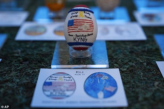 An egg designed by children of members of the military decorating the East Colonnade of the White House prior to the White House Easter Egg Roll, Thursday, March 28, 2024