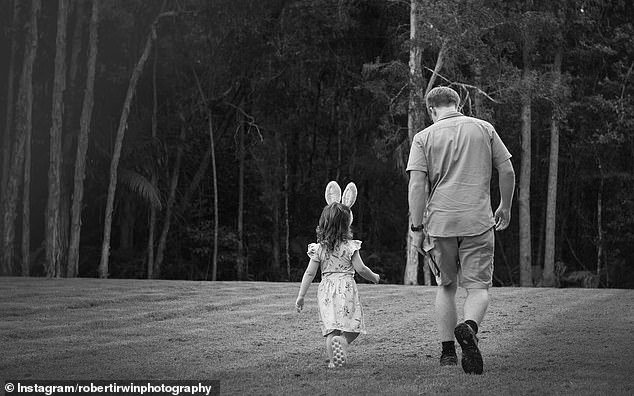 Robert Irwin, 20, also shared an adorable throwback photo on Instagram with his niece Grace, three, as he marks Easter Sunday in South Africa this year while filming I'm A Celebrity