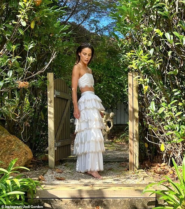 The former Home and Away star, 39, caused up a storm in her garden as she made the most of the long weekend by relaxing in the balmy weather