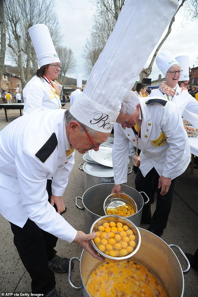 About 15,000 eggs are used to create the enormous feast, which is cooked in one pot and served to 2,000 people