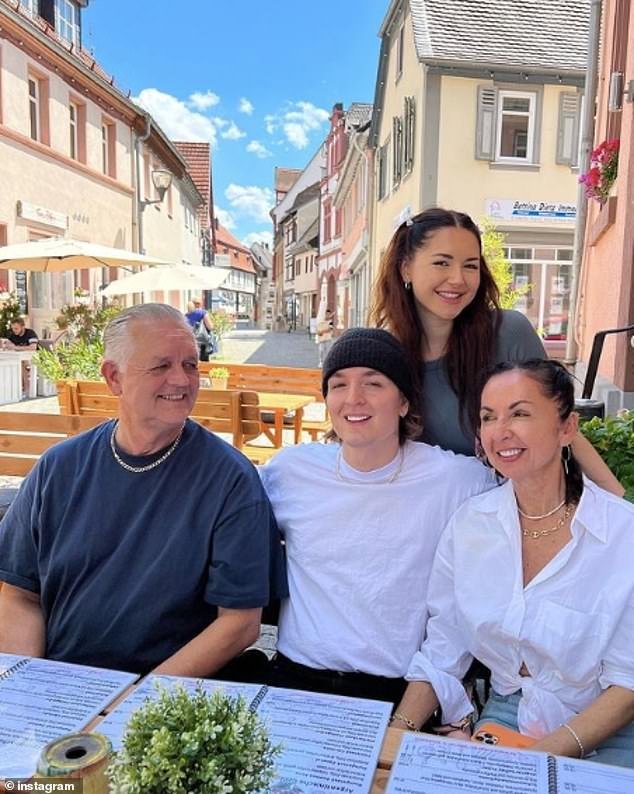 Anna Paul's father Hanns has dismissed claims that he is homeless and that his daughter does not support him financially despite earning millions as a social media star.  (Photo: Anna with her father Hanns, brother Atis and her mother)