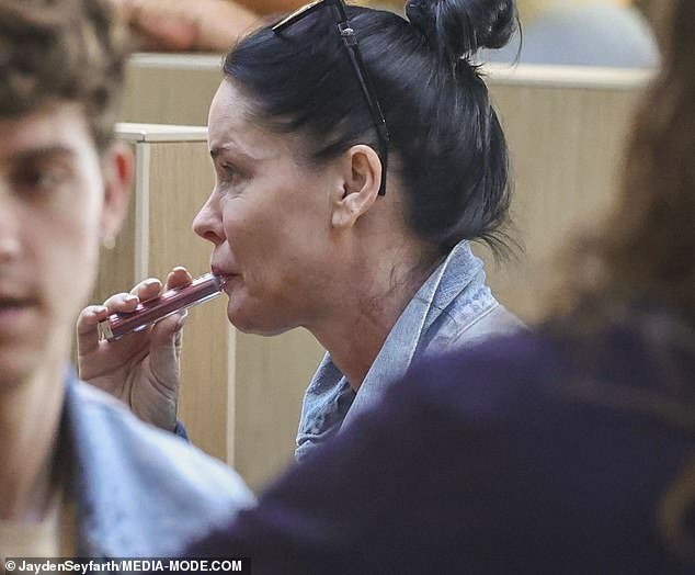 The lead singer of '90s pop group Aqua, Lene Nystrøm, was spotted puffing on a vape in the Sydney Airport food court on Wednesday following her bizarre on-stage behavior during the band's concert in Perth last week