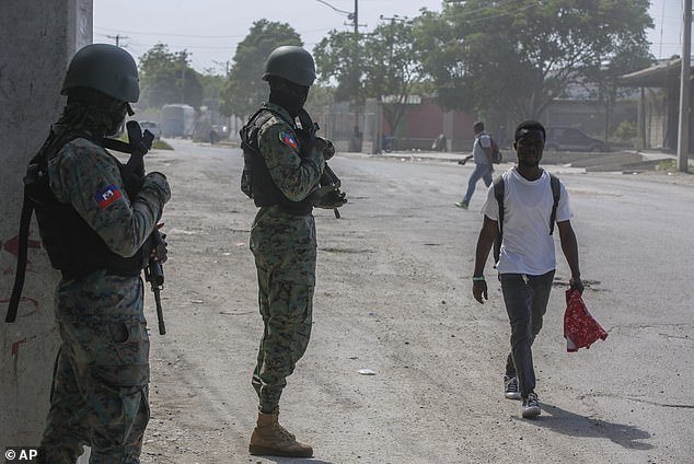 The Biden administration is considering processing Haitian migrants at Guantanamo Bay if a mass exodus takes place fleeing gang-fueled violence.  Soldiers patrol the streets of Port-au-Prince on Wednesday