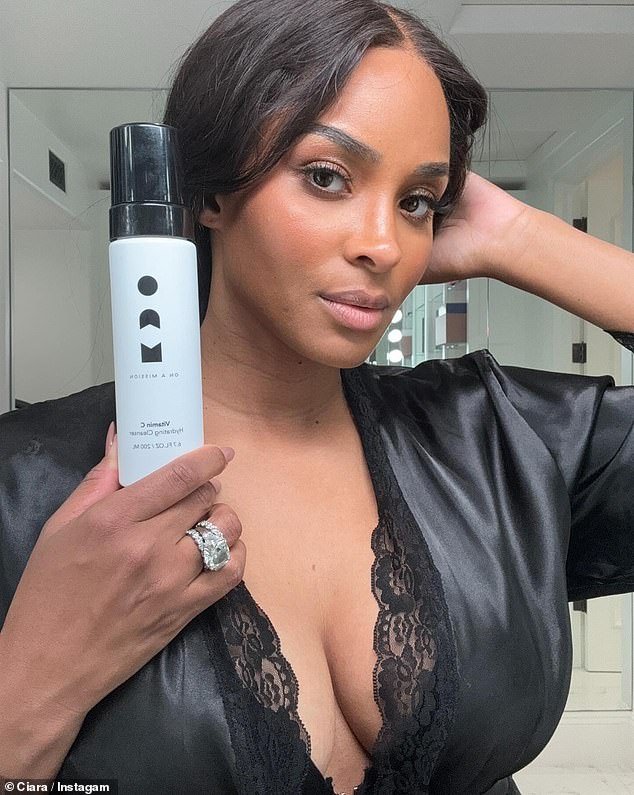Ciara, 38, got flirty in a deep black ensemble as she got into promo mode for her company OAM Skin By Ciara in an Instagram post